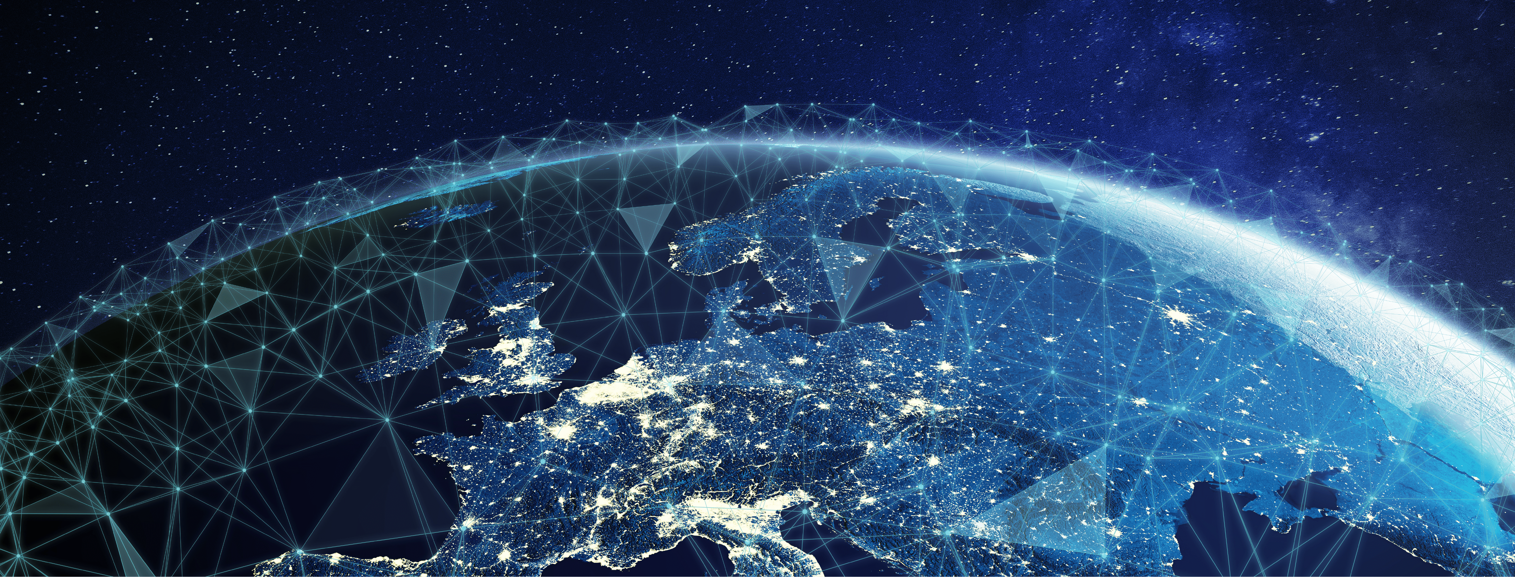 Blue tinted tech image of a world globe lit up by electricity with a network grid overlaid