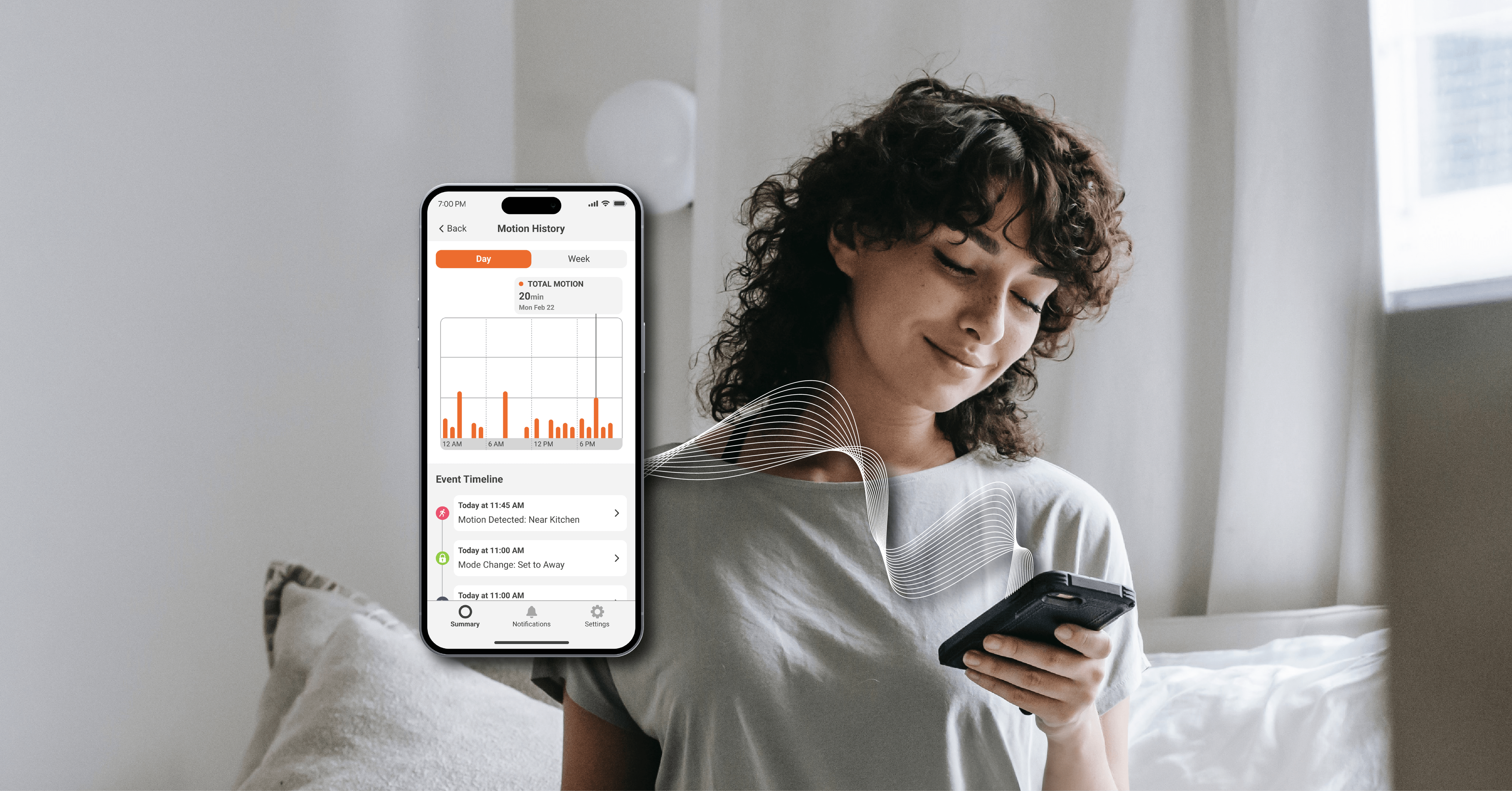 Smiling woman looking down at her cellphone with an overlaid screenshot of Cognitive's Home Aware app, a Wi-Fi Sensing solution for home monitoring